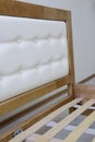 headboard with soft white leather upholstery Royalty Free Stock Photo