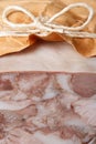 Headcheese wrapped in paper macro vertical Royalty Free Stock Photo