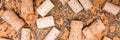 Header, wine and champagne cork spreading on untreated cork Royalty Free Stock Photo