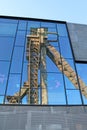 Headframe of C-mine in Belgium reflected in glass Royalty Free Stock Photo