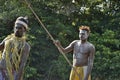 Headhunter of a tribe of Asmat with an oar Royalty Free Stock Photo