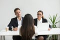 Headhunters interviewing female job candidate Royalty Free Stock Photo