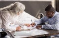 Manager Woman Signing Employment Contract With Employee Man In Office Royalty Free Stock Photo