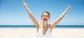 Happy woman in swimsuit at sandy beach on sunny day rejoicing Royalty Free Stock Photo