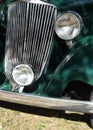 Detail of the headlamp and grill of 1930`s classic car Royalty Free Stock Photo