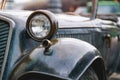 headlamp Retro Bronze car in rain weather Royalty Free Stock Photo