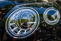 Headlamp of ultra luxury crossover SUV Bentley Bentayga, 2016.