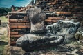 Headless and handless ancient sculpture of Buddha