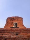 Headless, one handless of old laterite buddha statue Royalty Free Stock Photo