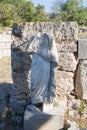 Headless statue on the archaeological site of Ancient Corint, Gr