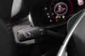 Headlight adjustment knob in the car - Image