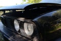 HEADLIGHT BLACK OLD CAR YOUNGTIMER Royalty Free Stock Photo