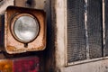 Headlight and close view of old tractor parts