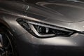 Headlight of grey modern car with LED light