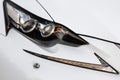 Headlight lamp of modern new white car Royalty Free Stock Photo