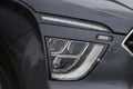 Headlight lamp of new cars. Close up detail on one of the LED headlights modern car. Royalty Free Stock Photo