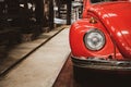 Headlight lamp vintage classic car parked in garage