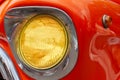 Headlight on orange retro car