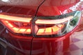 orange headlight of red car, transportation industry Royalty Free Stock Photo
