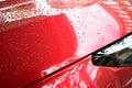 close up headlight of red car, transportation industry Royalty Free Stock Photo