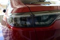 close up headlight of red car, transportation industry Royalty Free Stock Photo