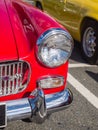 Headlight of vintage classic cars taking part in a trail run in