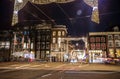 Headlights car passing down street at night Royalty Free Stock Photo