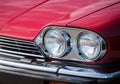 Headlights red vintage car close up Royalty Free Stock Photo