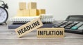 headline inflation on the work table and alarm clock.