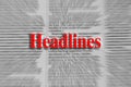 Headlines written in red with a newspaper article blurred Royalty Free Stock Photo