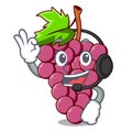With headphone red grapes fruit in cartoon basket