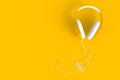 Headphones abstract minimal yellow background, Music concept Royalty Free Stock Photo