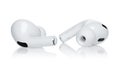 Headphones Apple Air Pods Pro 2 on white background, front view. AirPods are wireless Bluetooth earbuds designed by Apple Inc