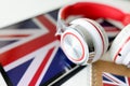 Headphones on the background of the flag of Great Britain Royalty Free Stock Photo