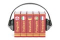 Headphones and books, languages learning and translate concept.