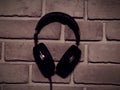 Headphones on Bricks backround Royalty Free Stock Photo