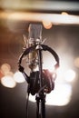 Headphones and Condenser Microphone in a Music Recording Studio