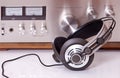 Headphones connected to vintage audio stereo Royalty Free Stock Photo