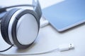 Headphones digital tablet and USB cable Royalty Free Stock Photo