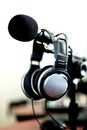 Headphones on microphone stand Royalty Free Stock Photo