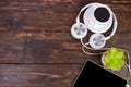 Headphones, mobile phone, idiobook, coffee cup on a wooden table. The concept of leisure and learning, hobby. Listen to music, Royalty Free Stock Photo