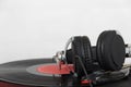 Headphones on an old retro record player Royalty Free Stock Photo