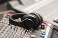 Headphones on Sound Mixer In Professional Radio Studio Royalty Free Stock Photo