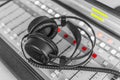 Headphones on sound mixer Royalty Free Stock Photo