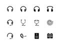 Headphones and speakers icons on white background.