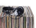 Headphones and stack of vinyle records. Royalty Free Stock Photo