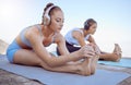 Headphones, stretching and women in beach yoga for radio fitness, relax workout or zen exercise in nature. Friends