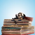 Headphones and vinyl records. Royalty Free Stock Photo