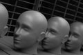 The heads of the mannequins stand on a shelf in a queue one after the other. Concept photography