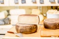 Seasoned cheese with slicer on the table